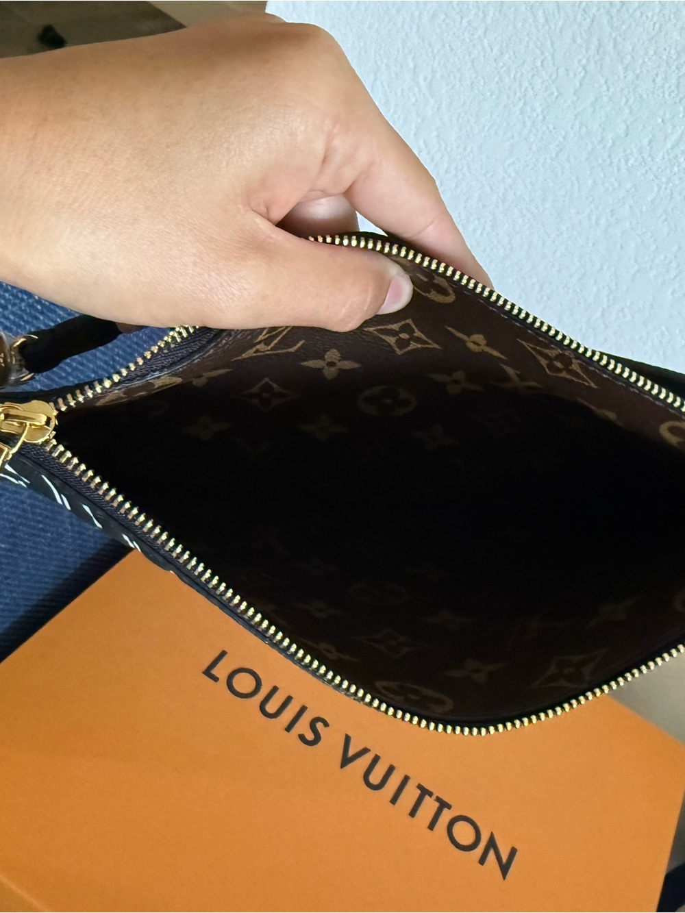 Louis Vuitton Black and White Stripe Wristlet with Gold Hardware - Picture 3 of 7